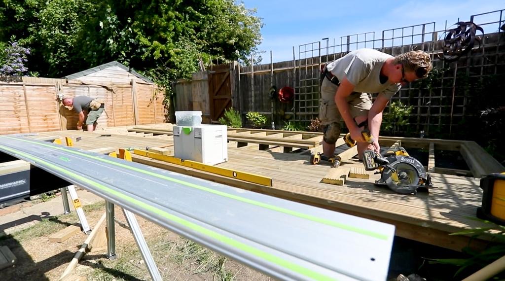 Two-person SL Carpentry crew building a timber deck