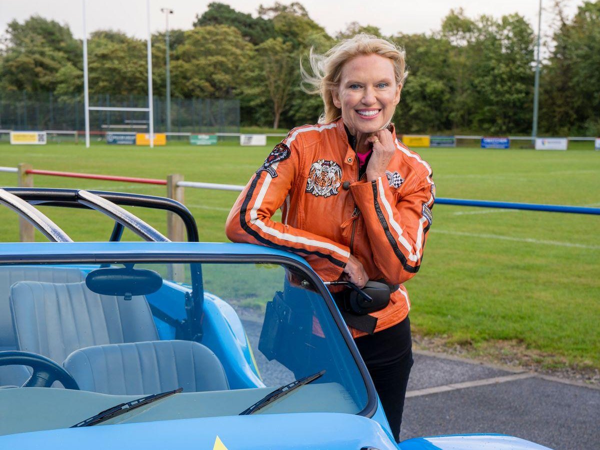 Anneka Rice with her Challenge Anneka-branded jeep, on set during filming of the Foal Farm animal-rescue charity build